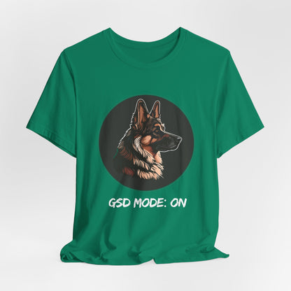 Green t-shirt with a dog graphic and 'GSD Mode: On' text on a white background