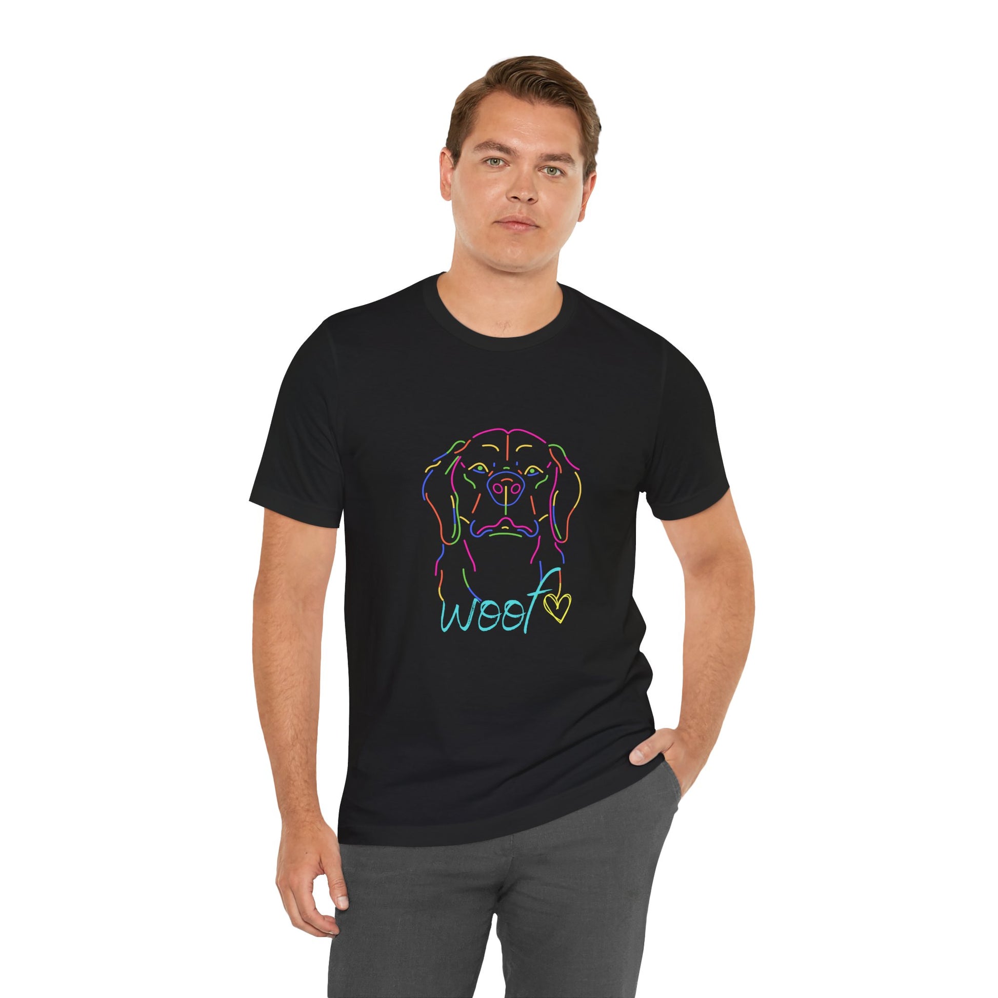 Man wearing a black t-shirt with a colorful dog graphic and 'WOOF' text on a white background