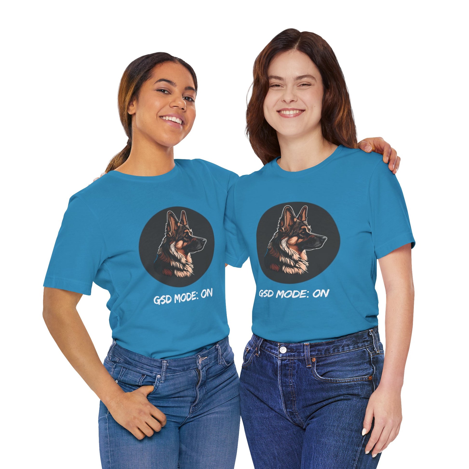 Two people wearing blue t-shirts with a dog graphic and text on a white background