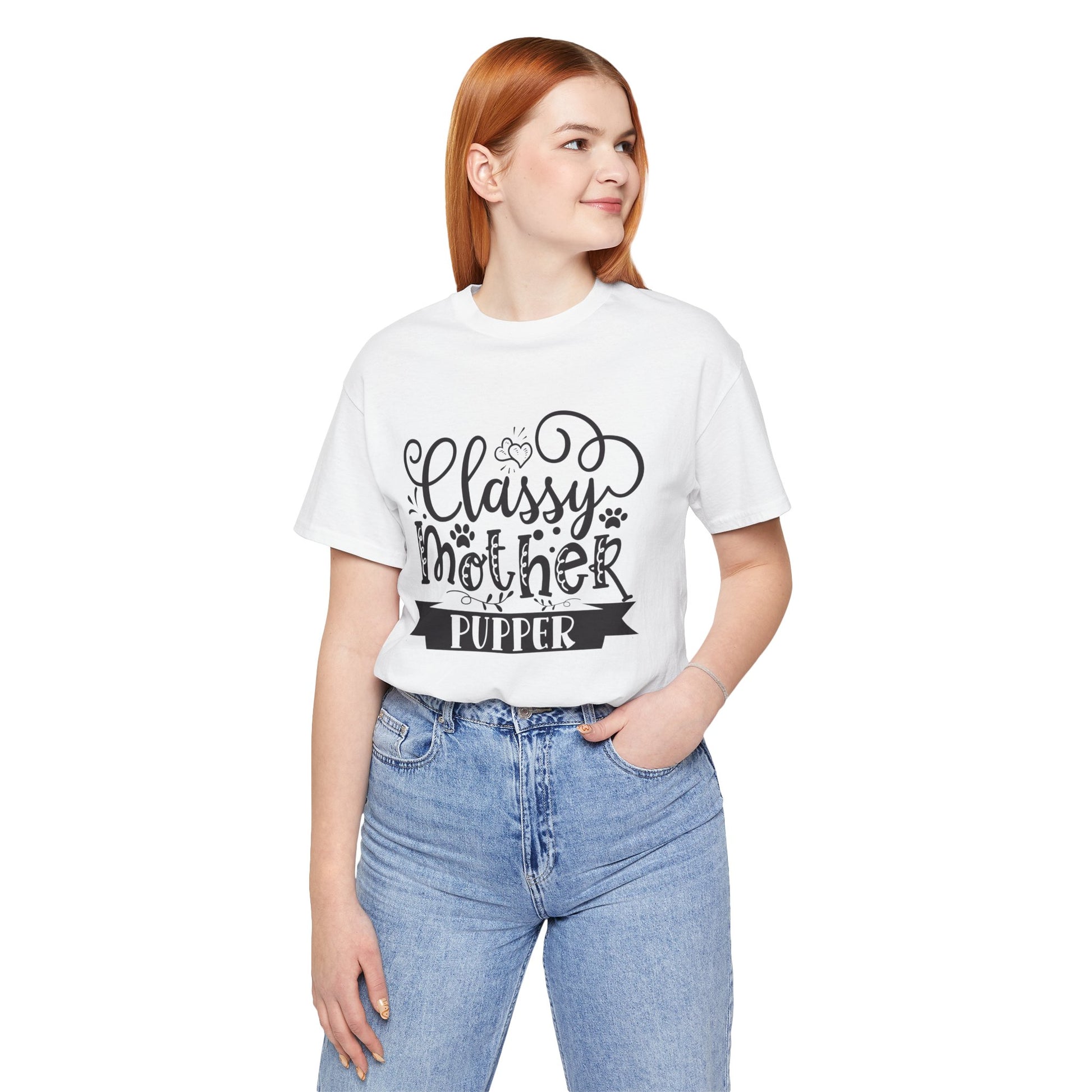 Person wearing a white t-shirt with text and blue jeans on a white background