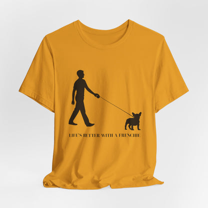 Yellow t-shirt with a black graphic of a person walking a dog and text on a white background