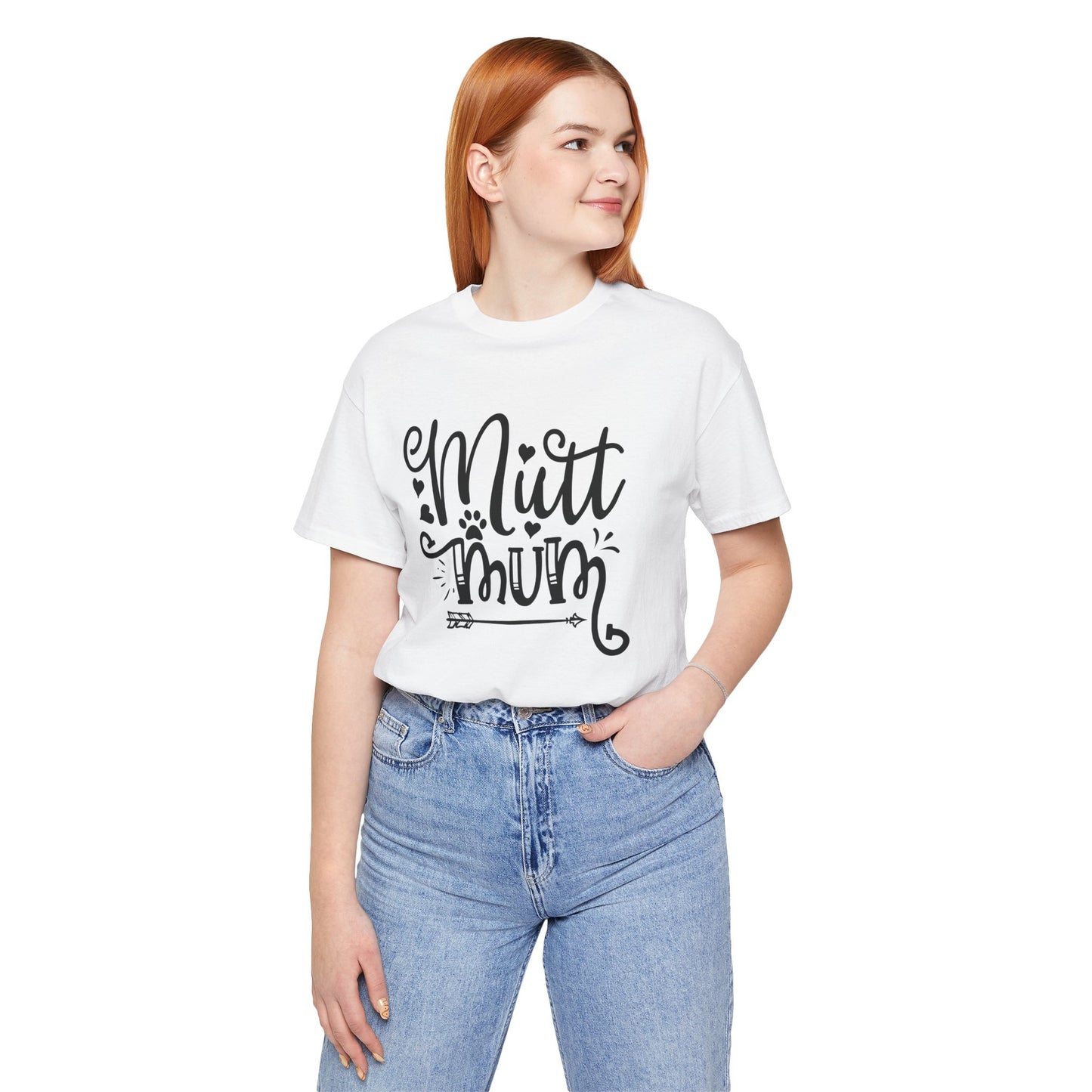 Person wearing a white t-shirt with 'Mutt Mum' text and blue jeans on a white background