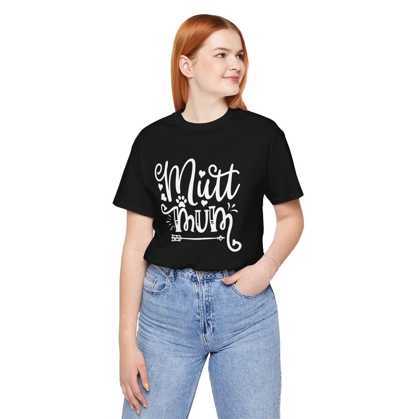 Person wearing a black t-shirt with 'Mutt Mum' text and blue jeans on a white background