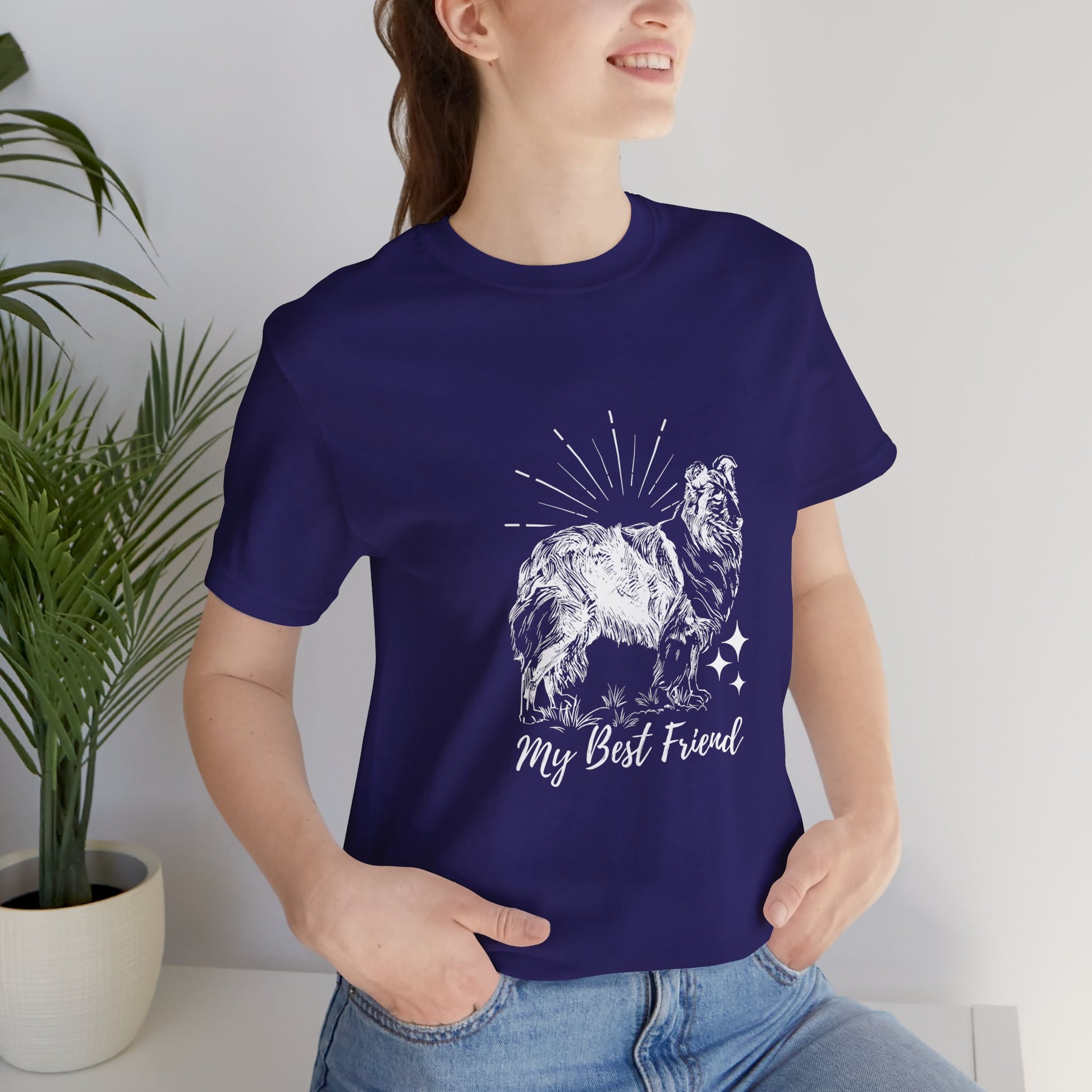Person wearing a navy blue t-shirt with a graphic of a dog and 'My Best Friend' text, standing indoors.