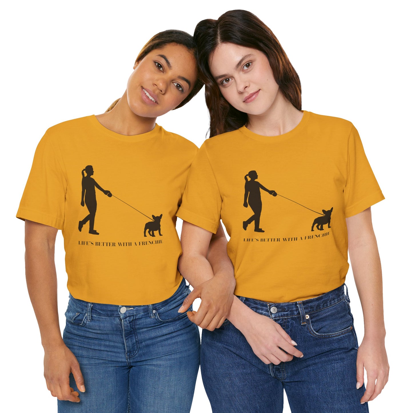 Two people wearing mustard yellow t-shirts with a graphic and text on a white background