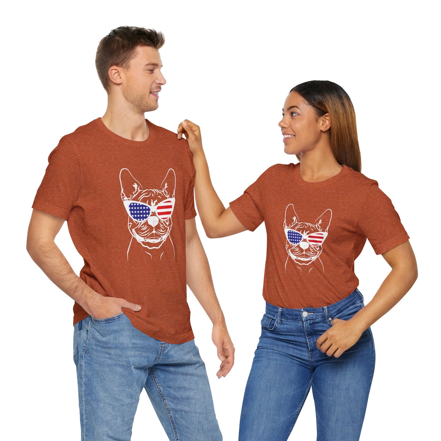 Two people wearing matching red t-shirts with a dog graphic and American flag sunglasses on a white background.