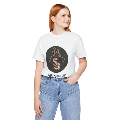Person wearing a white t-shirt with a dog graphic and 'GSD Mode: On' text on a white background