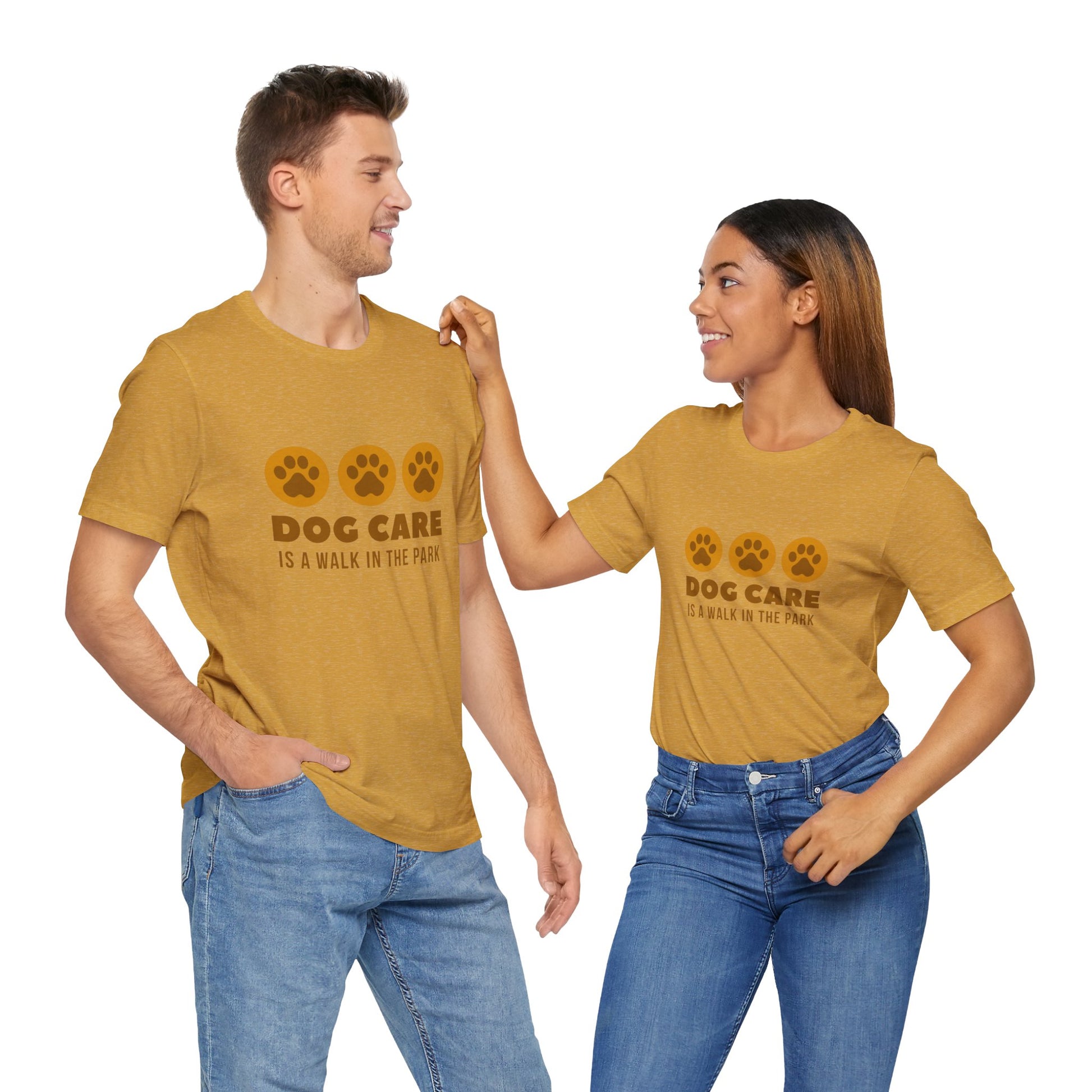 Two people wearing mustard yellow t-shirts with 'Dog Care is a Walk in the Park' text.