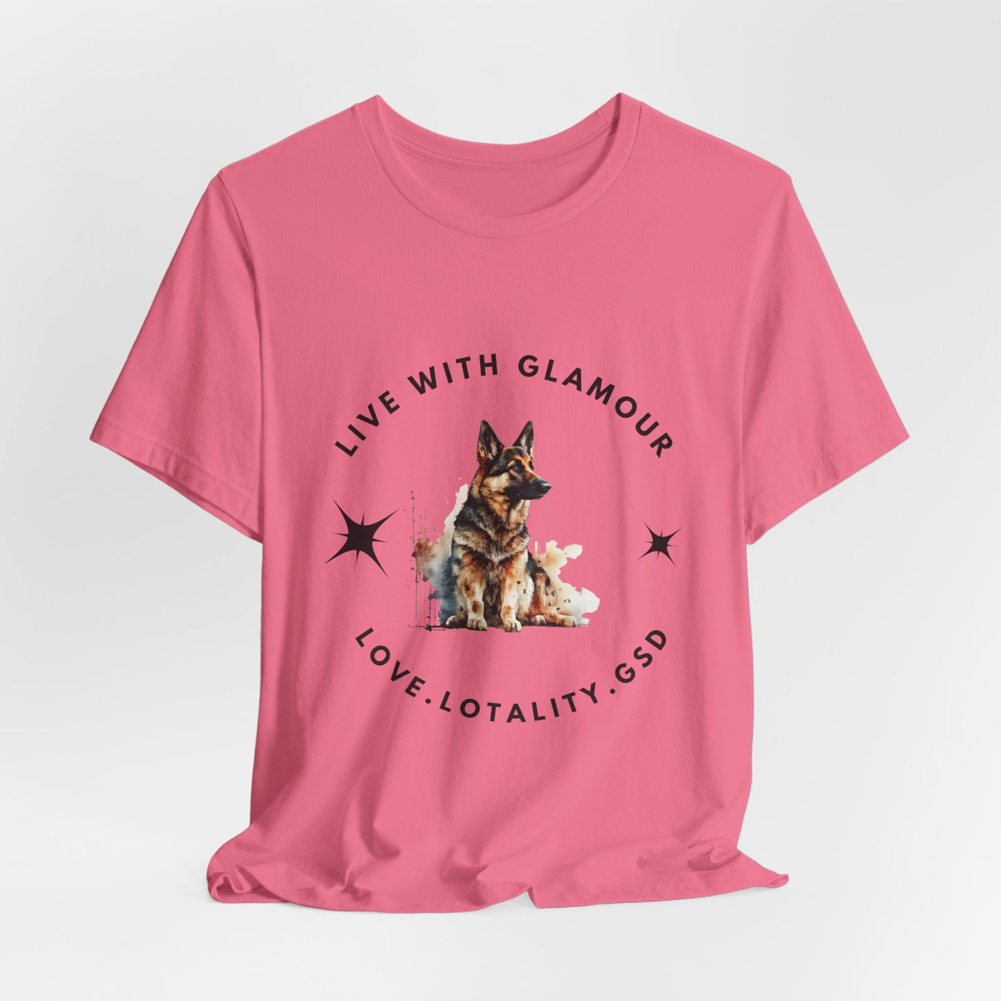 Pink t-shirt with a dog graphic and text on a white background