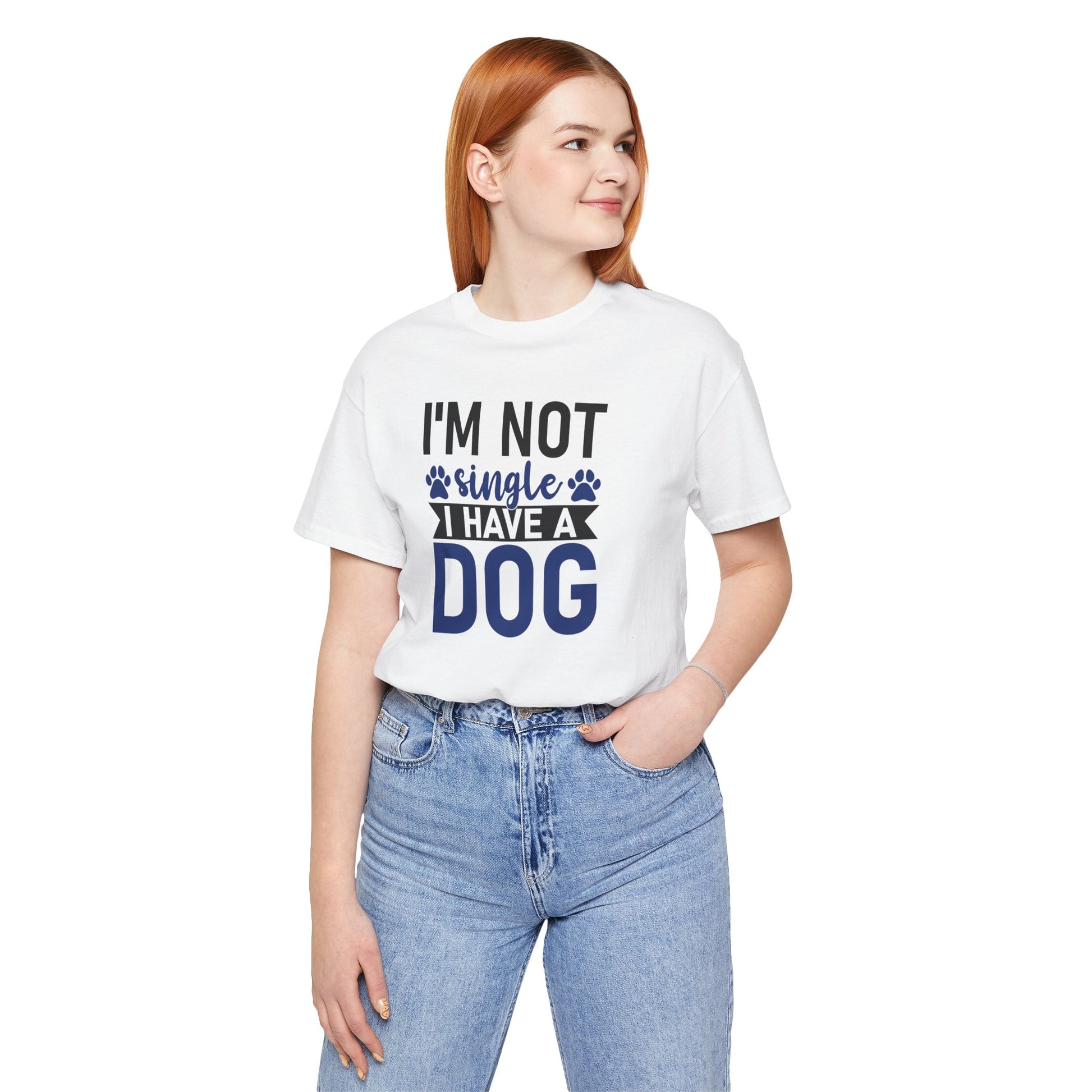 Person wearing a white t-shirt with 'I'm not single, I have a dog' text on a white background