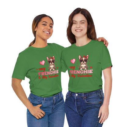 Two people wearing green t-shirts with a dog graphic and text on a white background