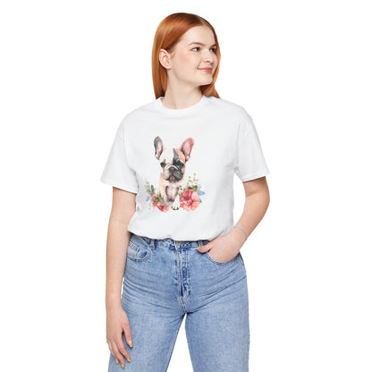 Person wearing a white t-shirt with a dog graphic and floral elements on a white background