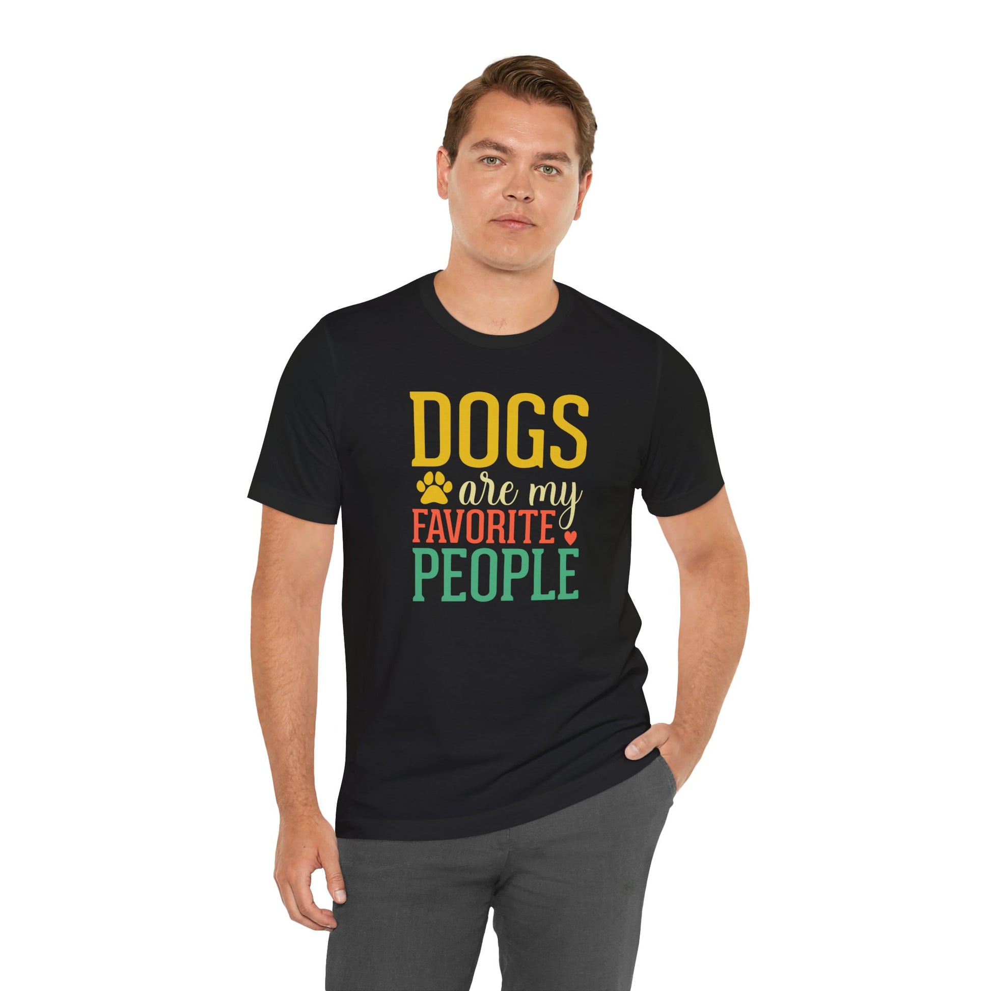 Man wearing a black t-shirt with colorful text 'DOGS are my FAVORITE PEOPLE' on a white background
