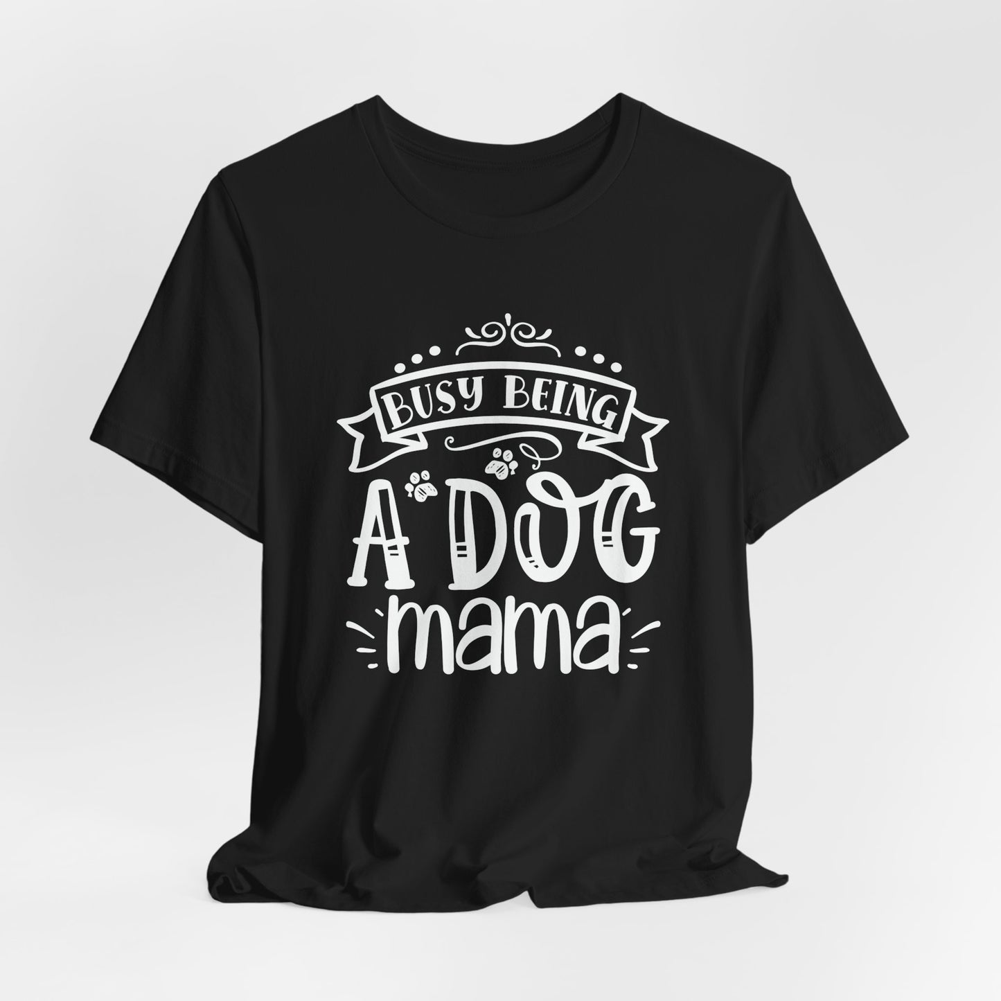 Black t-shirt with 'Busy Being A Dog Mama' text on a white background