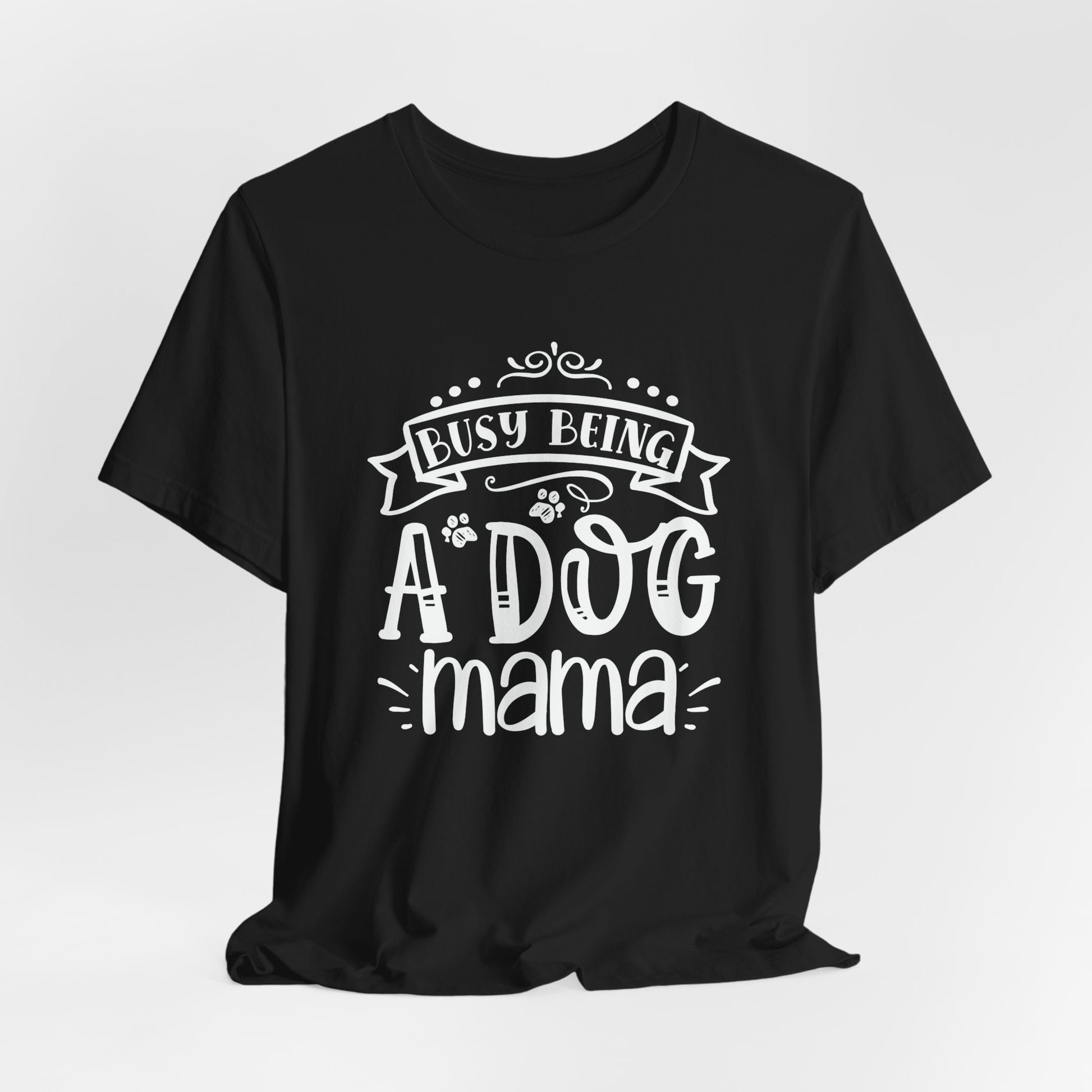 Black t-shirt with 'Busy Being A Dog Mama' text on a white background
