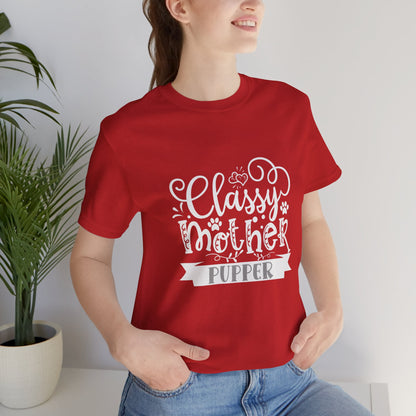 Person wearing a red t-shirt with white text in a home setting