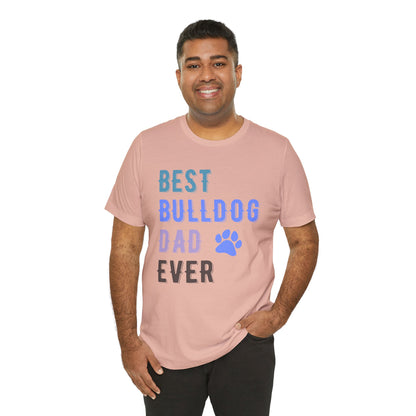 Man wearing a pink t-shirt with 'Best Bulldog Dad Ever' text on a white background