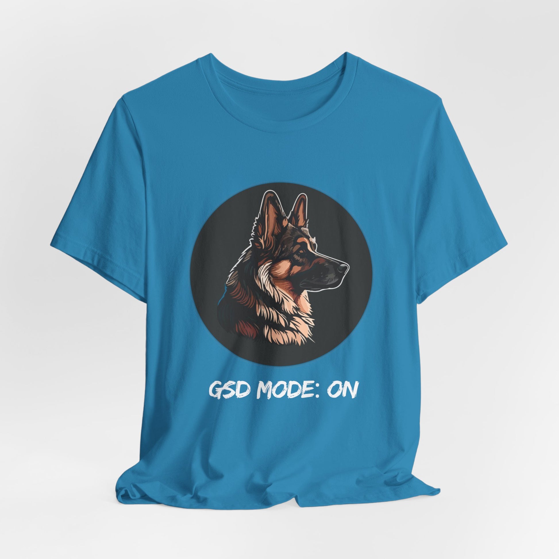 Blue t-shirt with a German Shepherd graphic and 'GSD Mode: ON' text on a light gray background